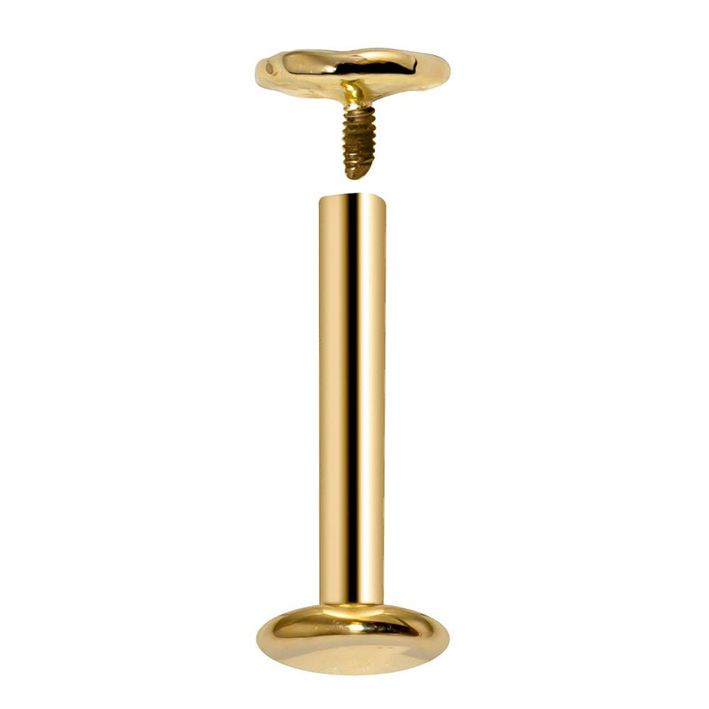 14K yellow gold flat back labret disassembled showing internally threaded post and heart charm separated
