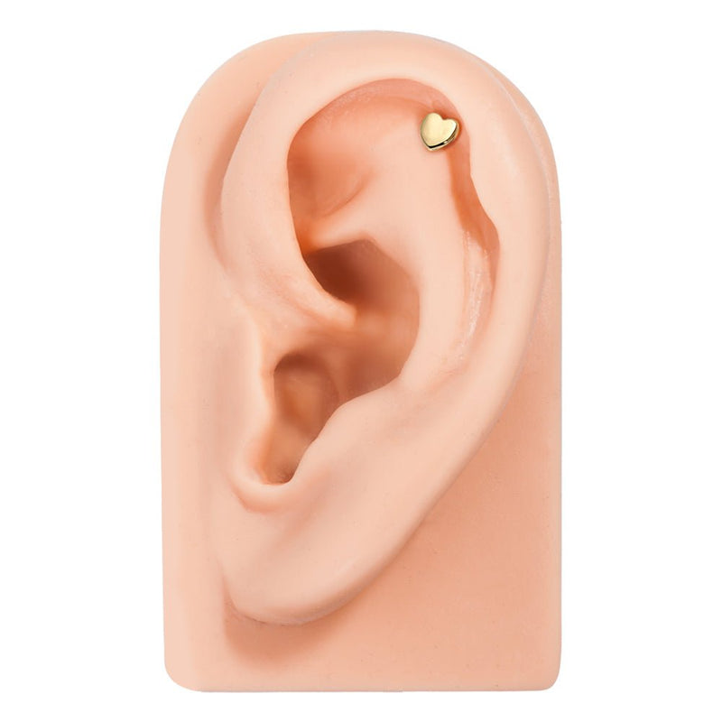 14K yellow gold heart cartilage flat back stud on ear mannequin in helix position