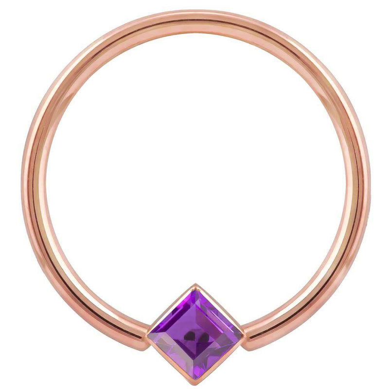 14k rose gold fixed bead ring with purple princess-cut CZ in corner-mount bezel, front view