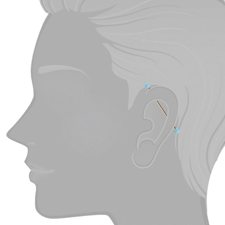 14G simulated turquoise 14K gold industrial barbell shown on ear model illustrating cartilage placement