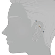 14K gold peacock pearl industrial barbell shown in ear cartilage piercing for fit reference