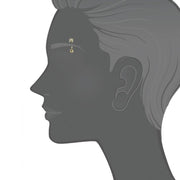Spider 14K gold curved barbell shown in eyebrow piercing placement on illustrated face silhouette