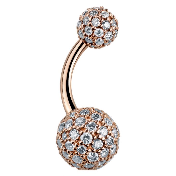 Close-up of 14k rose gold navel ring highlighting pave diamond setting detail on large lower ball