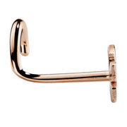 Reverse side of 14K rose gold butterfly nose bone showing flat post and textured charm back