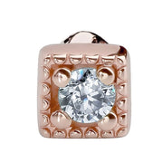 Close-up front view of 14K rose gold square CZ nose ring head showing beaded border and CZ sparkle
