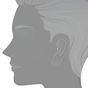 14K gold cross cartilage earring shown in tragus piercing on illustrated ear diagram