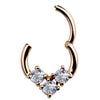 14K rose gold CZ clicker ring shown open, revealing hinged segment mechanism and clicker closure