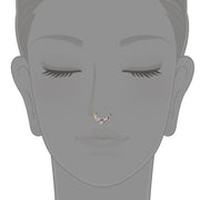 14K rose gold CZ clicker ring illustrated as a septum piercing on a neutral face diagram
