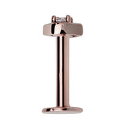 14K rose gold flat back labret post assembled, showing barbell length, disc base, and eye-shaped top