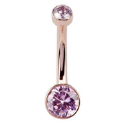 14K rose gold Petite Bella belly ring with dual pink CZ bezel settings, straight front view