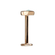 Side profile of rose gold crescent moon opal flat back labret showing low-profile top and post length