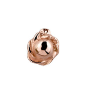 Close-up of 14K rose gold rose bud nose stud charm showing detailed petal texture and domed center