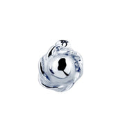 Close-up of 14K white gold rose bud nose stud charm showing detailed petal texture and domed center