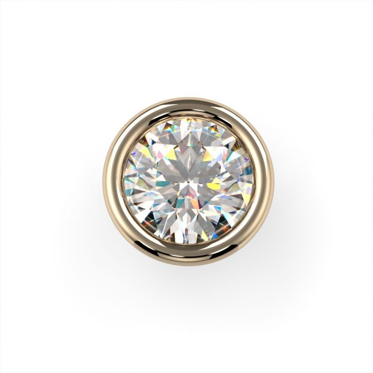 Top-down close-up of round diamond in 14K yellow gold bezel setting showcasing brilliant cut and warm gold rim