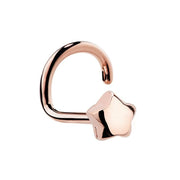 14K rose gold puffy star nose ring twist style, front view with warm-toned polished star end