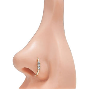 14K yellow gold diamond faux hoop nose ring shown on pierced nose, displaying hoop appearance from front