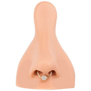 14K gold diamond flower clicker ring worn as septum ring on nose model for fit reference