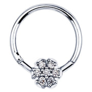 14K white gold hinged clicker ring with 7-diamond pavé flower setting, front view on white