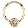 14K yellow gold hinged clicker ring with 7-diamond pavé flower charm, front view on white