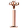 14k rose gold diamond flower labret disassembled, showing internally threaded flower top separated from post
