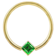 14k yellow gold fixed bead ring with green princess-cut CZ in corner bezel setting, front view