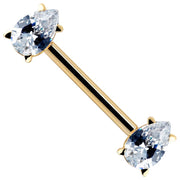 14k yellow gold straight barbell with two pear-cut CZ ends in prong settings, angled view