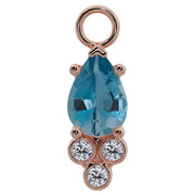 14K rose gold pear-cut aquamarine piercing charm with three bezel-set diamond accents, front view