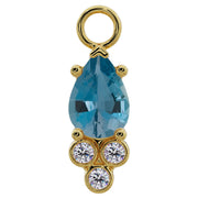 14K yellow gold piercing charm with pear-cut aquamarine and three bezel-set CZ accents, front view