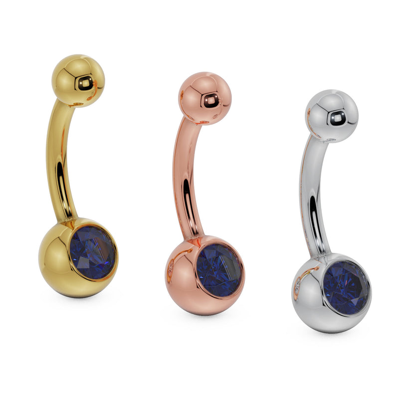 Blue CZ 14K gold belly button ring shown in yellow, rose, and white gold side by side