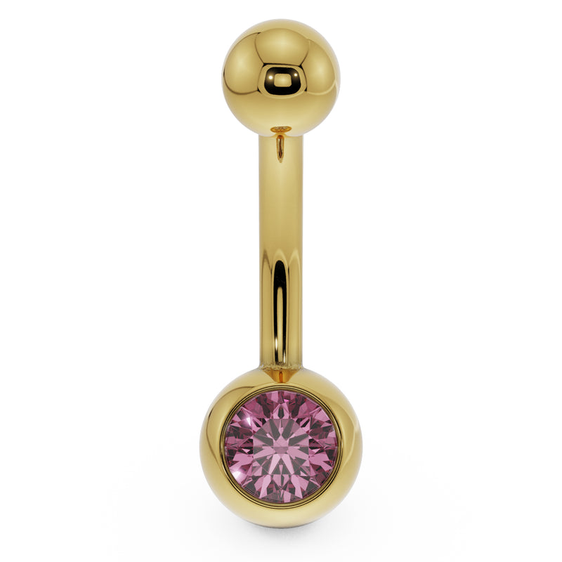 14K yellow gold navel ring with pink CZ round bezel setting, front view