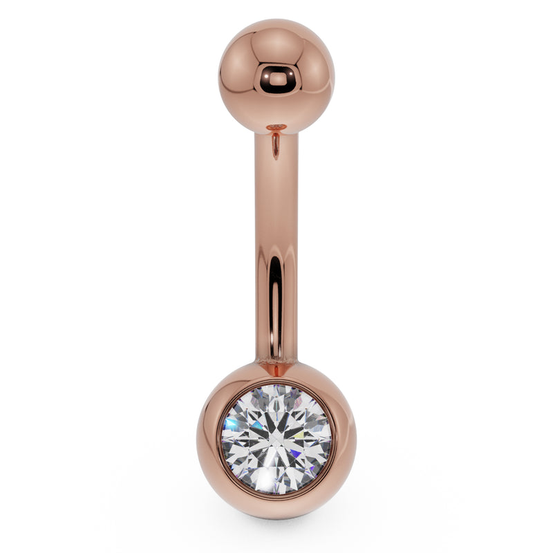14K rose gold navel ring with clear CZ in round bezel ball, front view