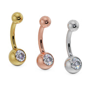 14K gold belly button ring with clear CZ shown in yellow, rose, and white gold options