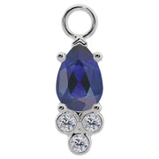 950 platinum pear-cut blue sapphire piercing charm with three bezel-set diamond accents, front view