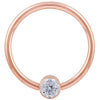14k rose gold CZ bezel fixed bead ring, closer crop emphasizing the bezel-set cubic zirconia detail