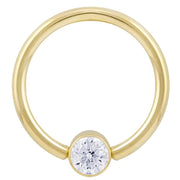 14k yellow gold CZ bezel fixed bead ring, front view showing round-cut cubic zirconia setting