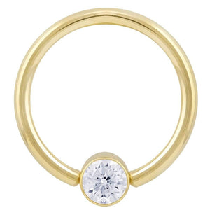 14k yellow gold CZ bezel fixed bead ring, front view showing round-cut cubic zirconia setting