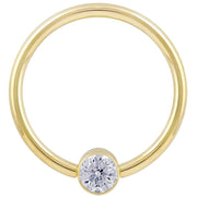 14k yellow gold CZ bezel fixed bead ring, slightly larger diameter showing polished hoop and bezel detail