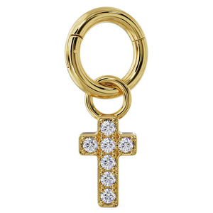 14k yellow gold diamond cross charm attached to a clicker ring, showing how it fits on hoop jewelry