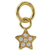 14K yellow gold diamond pavé star charm attached to a gold clicker ring, product styling view