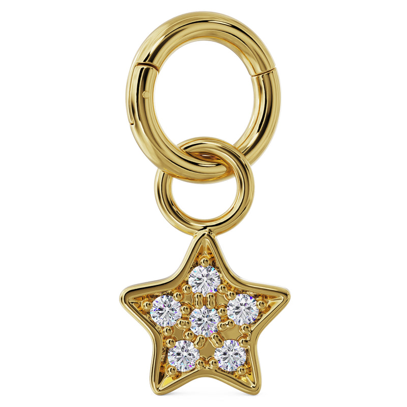 14K yellow gold diamond pavé star charm attached to a gold clicker ring, product styling view