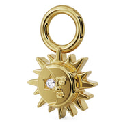 Angled side view of 14K yellow gold sun moon charm showing depth of raised ray and face detail
