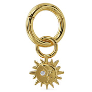 14K yellow gold sun moon diamond charm attached to a gold clicker ring, showing how it connects