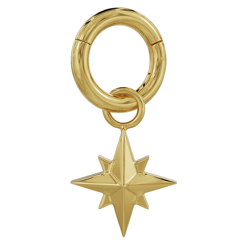 14k yellow gold north star charm attached to a clicker ring, showing how the charm connects to a hoop