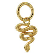 14K yellow gold snake charm hanging from a gold clicker hoop ring, showing attachment fit