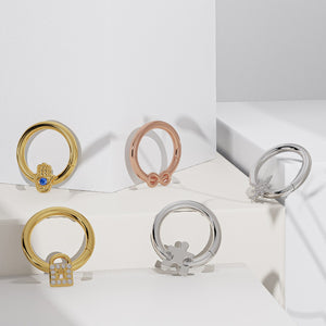 14K gold infinity seam ring shown alongside other symbol hoops in yellow, rose, and white gold