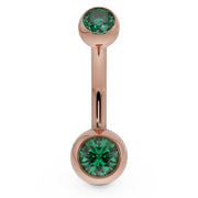14k rose gold double CZ belly ring with green bezel-set stones, front view