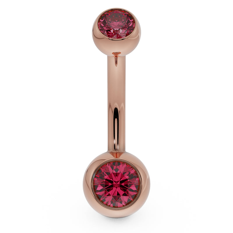 14k rose gold double CZ belly button ring with red bezel-set stones, front view