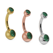Double green CZ navel ring in 14k yellow gold, rose gold, and white gold shown side by side