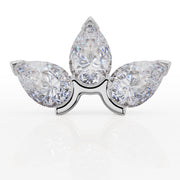 Front-facing close-up of white gold lotus stud showing three pear-cut CZ stones and prong setting
