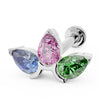 14K white gold flat back labret stud with three pear-cut pink sapphire, tanzanite, and tsavorite gems